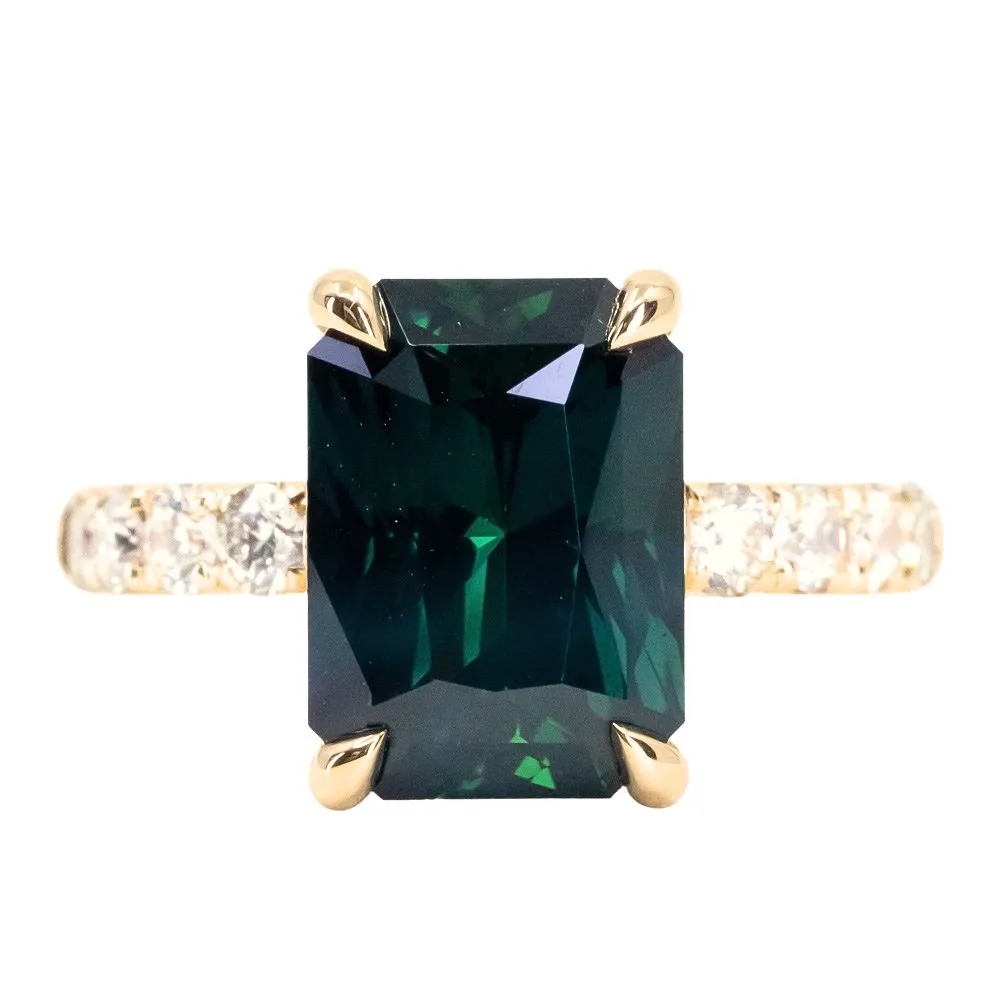 6.12ct Deep Teal Blue Madagascar Radiant Cut Sapphire Solitaire Ring with French Set Diamonds in 18k Yellow Gold